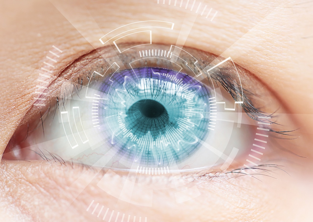 Close-up of a healthy human eye with a stylized digital overlay representing vision technology