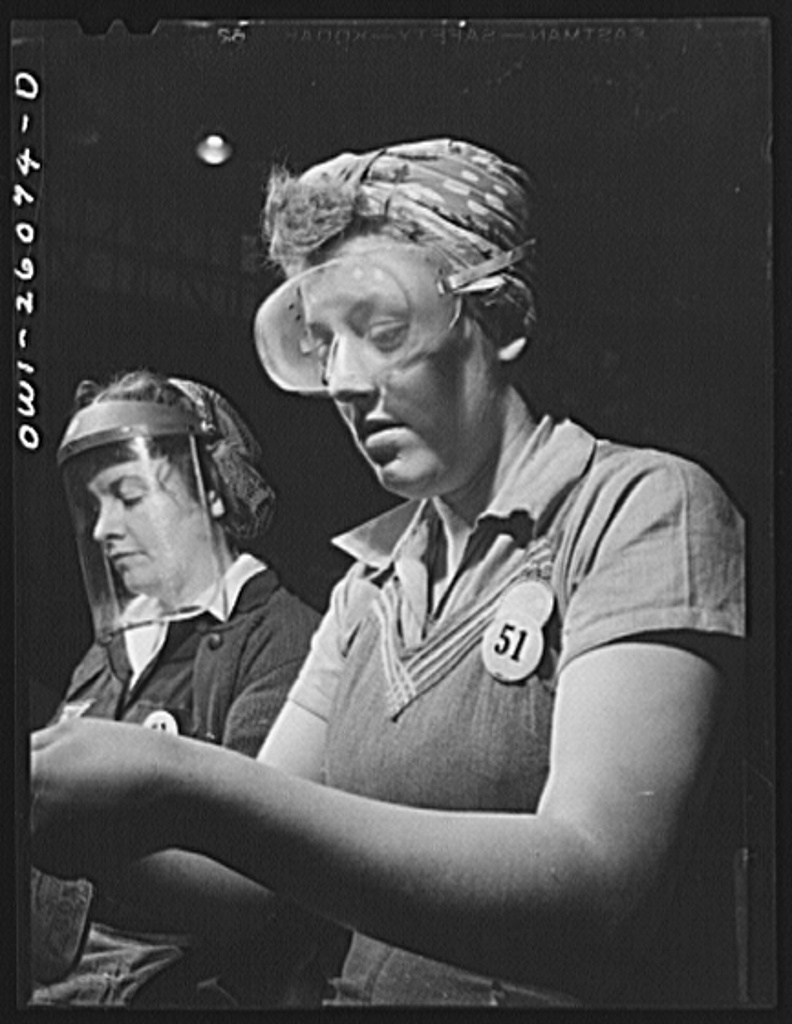 Workers wearing safety goggles