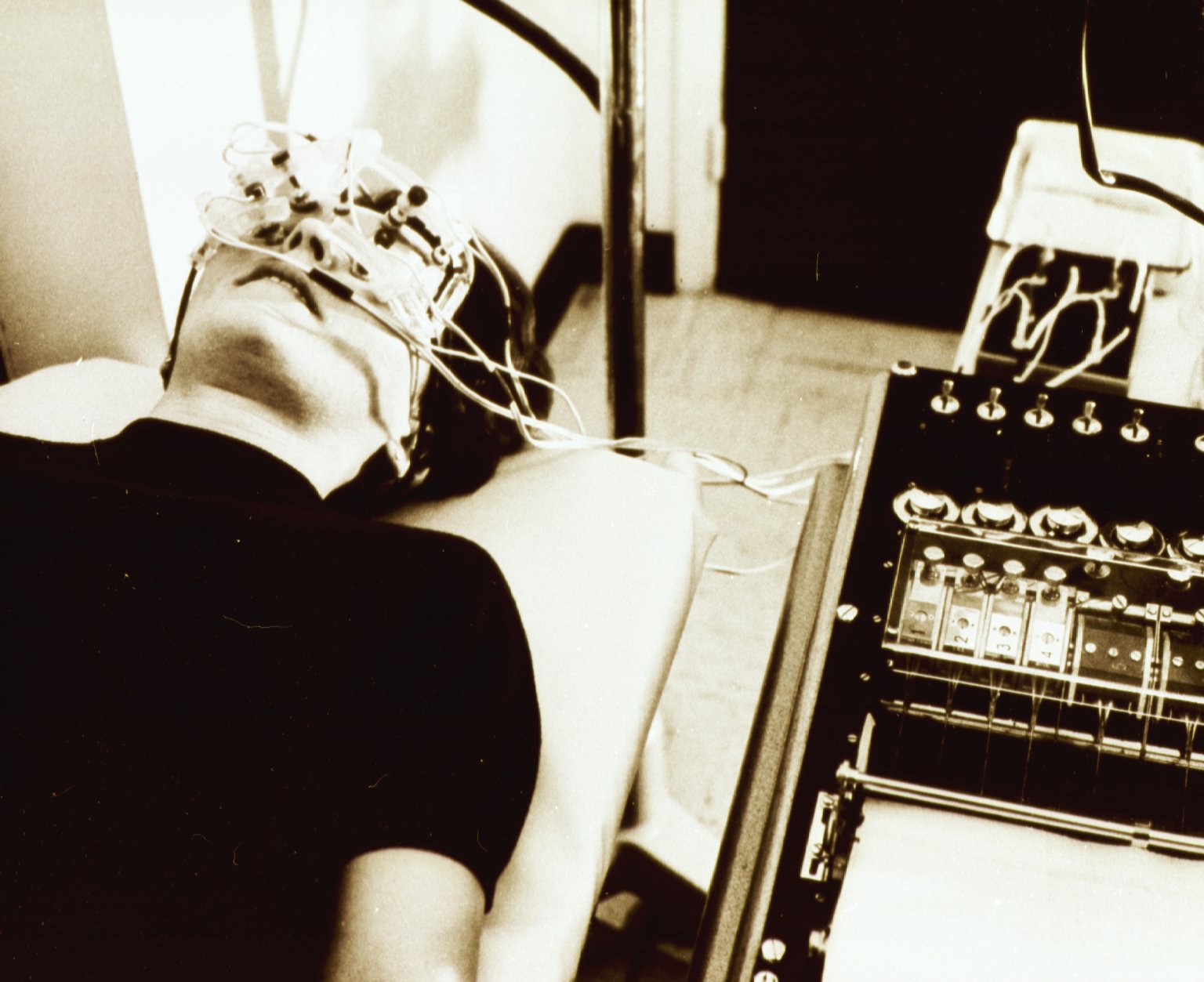 Patient undergoing electroretinography test with electrodes and recording equipment