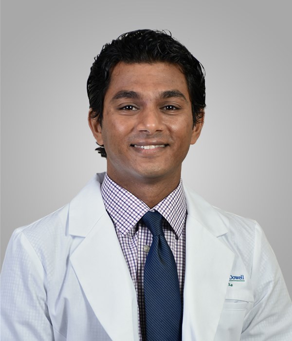 Dr. Manan Sampat