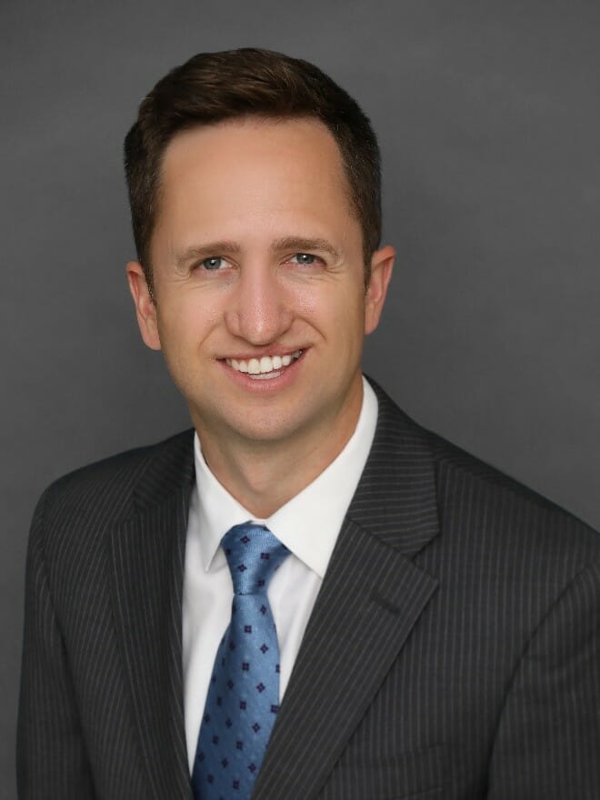 Dr. Austin James Woolley