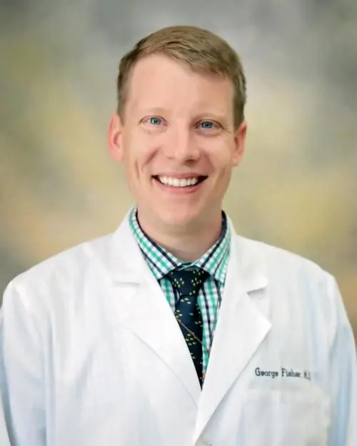 Dr. George Fisher